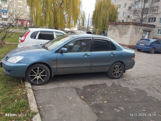 2009 Mitsubishi Lancer Classic IX Рестайлинг, серый, 450000 рублей, вид 4