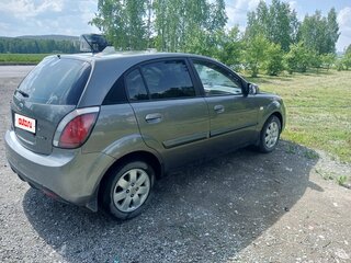 2010 Kia Rio II Рестайлинг, серебристый, 550000 рублей, вид 2