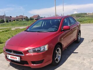 2008 Mitsubishi Lancer X, красный, 600000 рублей, вид 1