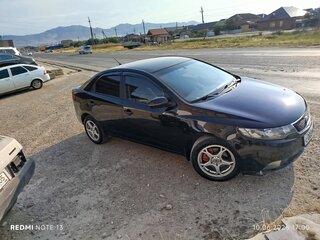 2011 Kia Cerato 6-speed II, чёрный, 570000 рублей, вид 1