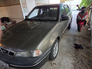 2003 Daewoo Nexia I, коричневый, 165000 рублей, вид 2