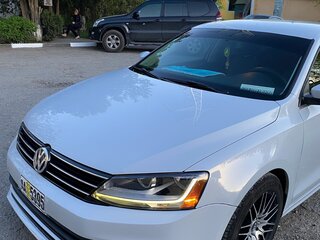 2016 Volkswagen Jetta VI Рестайлинг, белый, 1150000 рублей, вид 1