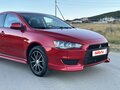2007 Mitsubishi Lancer X, красный - вид 4