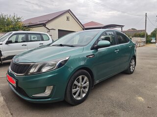 2012 Kia Rio 5-speed III, зелёный, 650000 рублей, вид 1