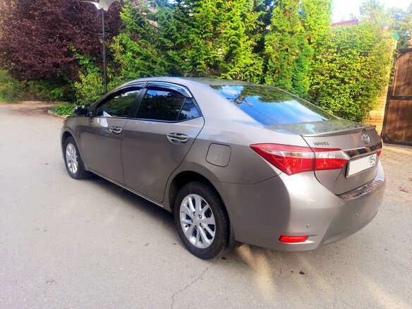 2014 Toyota Corolla XI (E160, E170, E180), золотистый, 1800000 рублей - вид 11