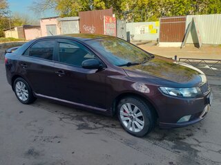 2011 Kia Cerato 6-speed II, пурпурный, 580000 рублей, вид 3