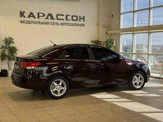 2009 Kia Cerato 4-speed II, фиолетовый, 735000 рублей, вид 2