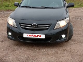 2009 Toyota Corolla X (E140, E150), чёрный, 650000 рублей, вид 2