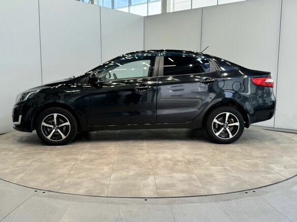 2012 Kia Rio 5-speed III, чёрный, 900000 рублей - вид 1