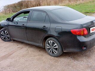 2009 Toyota Corolla X (E140, E150), чёрный, 650000 рублей, вид 5