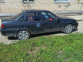 2012 Daewoo Nexia I Рестайлинг, чёрный, 175000 рублей, вид 2