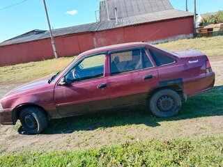 2012 Daewoo Nexia I Рестайлинг, красный, 130000 рублей, вид 5