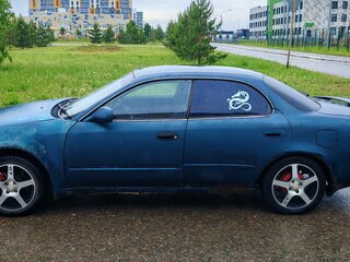 1993 Toyota Sprinter Marino, зелёный, 110000 рублей, вид 4
