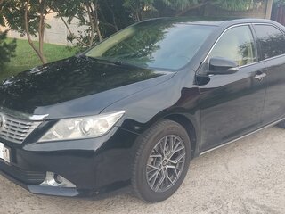 2012 Toyota Camry VII (XV50), чёрный, 1350000 рублей, вид 1