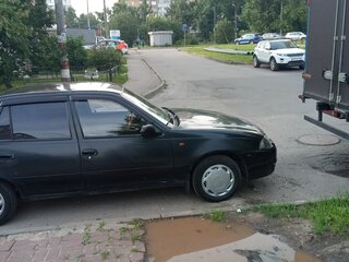 2010 Daewoo Nexia I Рестайлинг, чёрный, 100000 рублей, вид 2