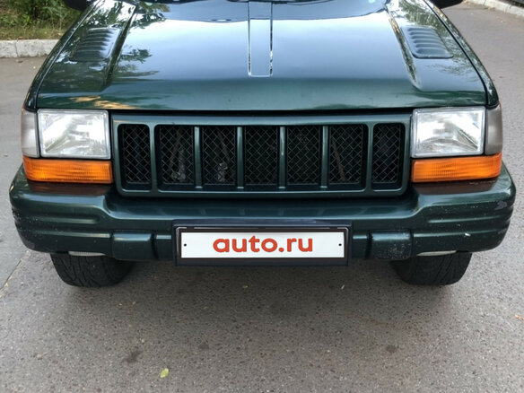 1997 Jeep Grand Cherokee I (ZJ) Рестайлинг, зелёный - вид 1