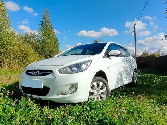 2011 Hyundai Solaris I, белый, 720000 рублей - вид 9