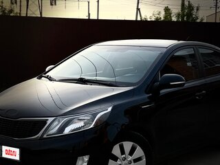 2013 Kia Rio 5-speed III, чёрный, 660000 рублей, вид 1