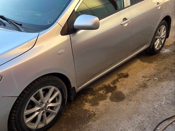 2008 Toyota Corolla X (E140, E150), серебристый - вид 3