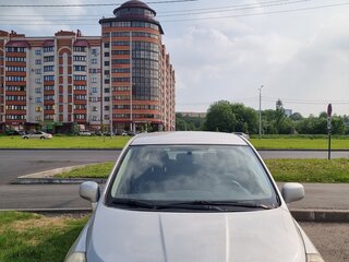 2010 Nissan Tiida I Рестайлинг, серебристый, 600000 рублей, вид 1