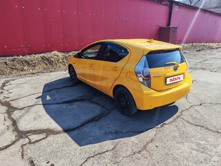 2012 Toyota Aqua I, жёлтый, 670000 рублей, вид 5