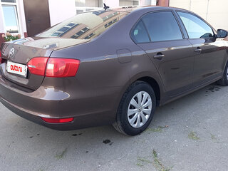 2014 Volkswagen Jetta VI Рестайлинг, коричневый, 980000 рублей, вид 2