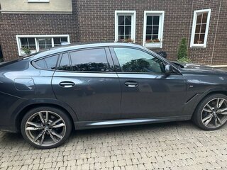 2021 BMW X6 40d III (G06), серый, 9000000 рублей, вид 4
