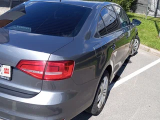 2015 Volkswagen Jetta VI Рестайлинг, серый, 880000 рублей, вид 5