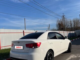 2011 Kia Cerato 6-speed II, белый, 1050000 рублей, вид 4