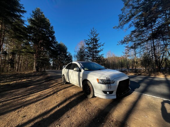 2010 Mitsubishi Lancer X, белый, 700000 рублей - вид 2