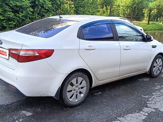 2014 Kia Rio 6-speed III, белый, 1250000 рублей, вид 5