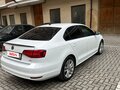 2016 Volkswagen Jetta VI Рестайлинг, белый, 1230000 рублей - вид 3