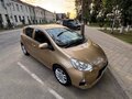 2012 Toyota Aqua I, жёлтый