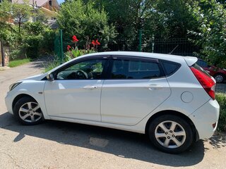 2012 Hyundai Solaris I, белый, 700000 рублей, вид 5