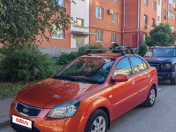 2011 Kia Rio II Рестайлинг, оранжевый, 490000 рублей - вид 4