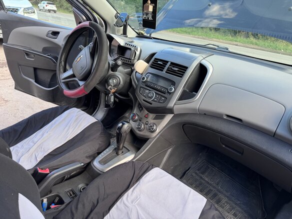 2012 Chevrolet Aveo II, чёрный, 660000 рублей - вид 7