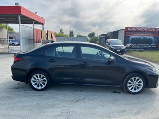 2020 Toyota Corolla XII (E210), чёрный, 1700000 рублей, вид 2