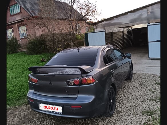 2010 Mitsubishi Lancer X, серый, 700000 рублей - вид 2