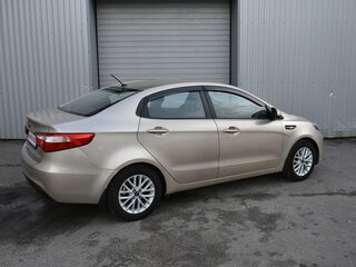 2014 Kia Rio 6-speed III, бежевый, 779000 рублей, вид 4