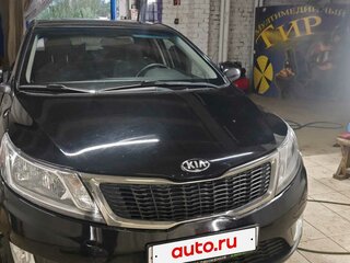 2014 Kia Rio 5-speed III, чёрный, 850000 рублей, вид 1