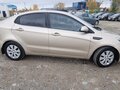2013 Kia Rio 5-speed III, бежевый, 520000 рублей - вид 4