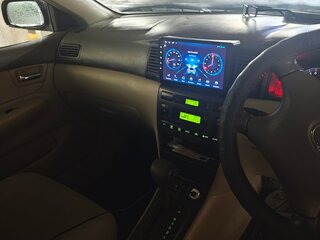 2004 Toyota Corolla IX (E120, E130) Рестайлинг, белый, 450000 рублей, вид 2