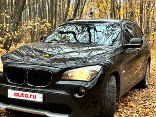 2011 BMW X1 18i I (E84), чёрный, 1000000 рублей, вид 1