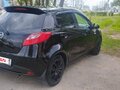 2012 Mazda 2 II Рестайлинг (DE2), чёрный, 820000 рублей - вид 2