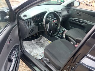 2010 Kia Rio II Рестайлинг, чёрный, 525000 рублей, вид 4