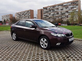 2010 Kia Cerato 4-speed II, пурпурный, 650000 рублей, вид 3