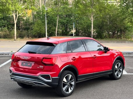 2023 Audi Q2 L 35 TFSI I Рестайлинг, красный, 2050000 рублей, вид 2