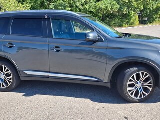 2016 Mitsubishi Outlander III Рестайлинг 2, серый, 1749000 рублей, вид 2