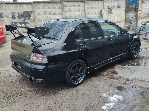 2002 Mitsubishi Lancer Evolution VII, чёрный, 1600000 рублей - вид 4