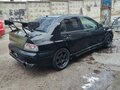 2002 Mitsubishi Lancer Evolution VII, чёрный, 1600000 рублей - вид 4